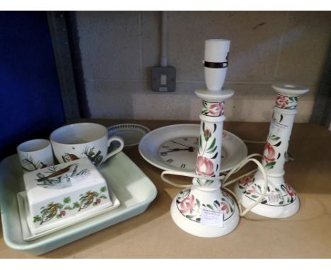 Shelf of mixed ceramics, including Portmeirion, Welsh Design table lamps and a wall clock. All electrical items in this lot h