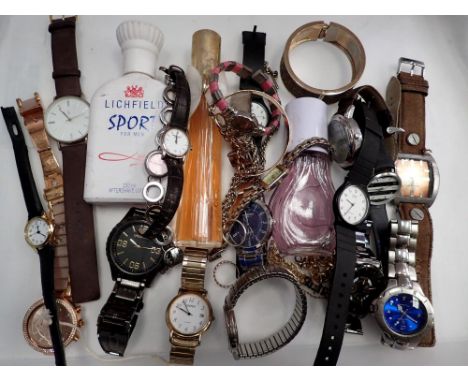 Mixed ladies and gents wristwatches and ladies perfumes. UK P&amp;P Group 2 (£20+VAT for the first lot and £4+VAT for subsequ