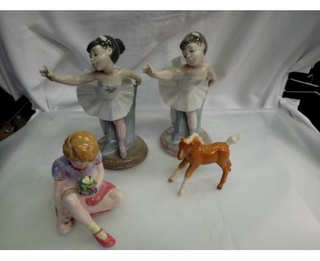 Two Nao figurines of ballerinas and a Crown Staffordshire figure of a seated girl a Beswick palomino foal, nip to ear (4). UK