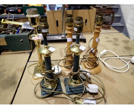 Group of five table lamps including two matching pairs and a single brass example. All electrical items in this lot have been