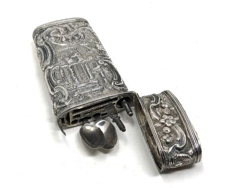 Fine  antique European solid silver etui / necessaire; with repousse rococo style decoration, and sprung-button hinged lid op