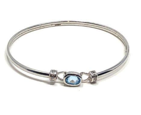 9ct white gold blue topaz and diamond set bangle (4.2g) 