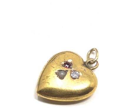 An antique 15ct gold diamond ruby &amp; seed pearl puffy heart pendant measures approx  18 x 15 mm Approx. 1.6 grams. 
