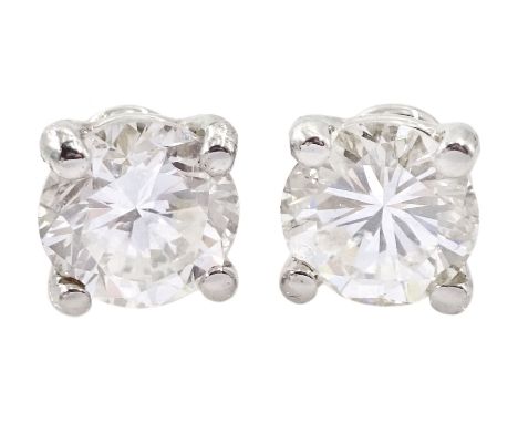 Pair of 18ct white gold round brilliant cut diamond stud earrings, hallmarked, total diamond weight approx 1.30 caratConditio