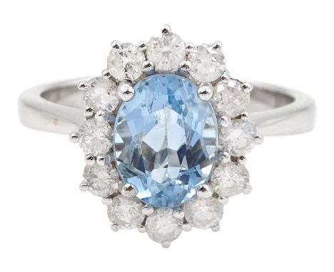 18ct white gold oval aquamarine and round brilliant cut diamond cluster ring, hallmarked, aquamarine approx 1.30 carat, total