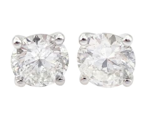 Pair of 18ct white gold round brilliant cut diamond stud earrings, hallmarked, total diamond weight 1.15 carat, with World Ge