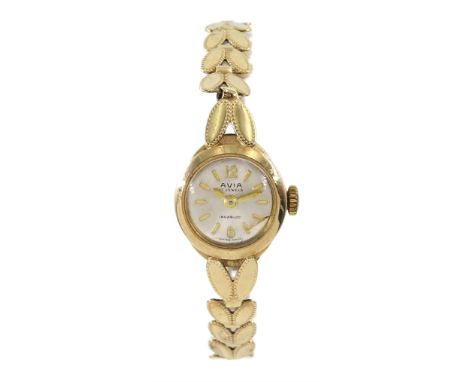 Avia 9ct gold ladies manual wind bracelet wristwatch, hallmarkedCondition Report:Approx 7.7gm (excluding movement), bracelet 