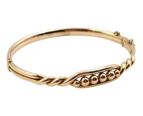 Victorian rose 9ct gold bead and twisted design bangleCondition Report:Approx 8.9gm, tested 9ct hinge good, clasp secure, spl