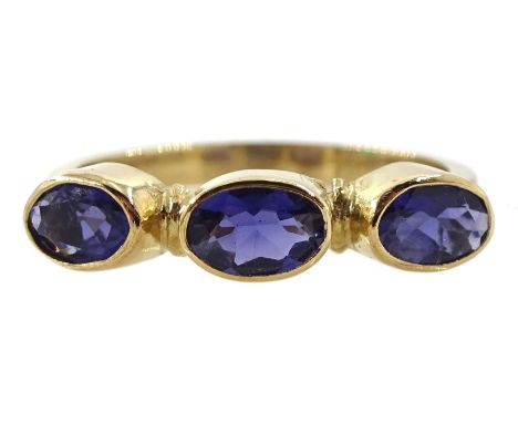 9ct gold three stone oval iolite ringCondition Report:Approx 2.9gm, size Q-R, tested 9ct