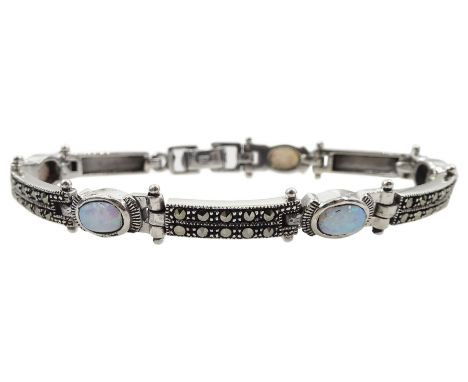 Silver oval opal and marcasite link bracelet, stamped 925Condition Report:Length = 18.5cm, good condition