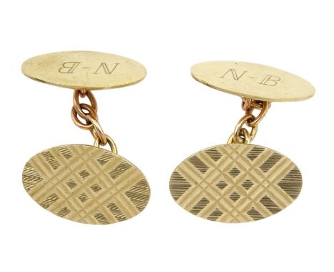 Pair of 9ct gold cufflinks with engine turned decoration and engraved initials 'N-B', hallmarked Condition Report:Approx 6.7g