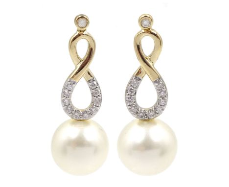 Pair of 9ct gold white cultured pearl and diamond pendant stud earrings, stamped 375Condition Report:Approx 5gm, length = 27m