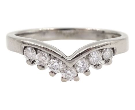 18ct white gold seven stone, round brilliant cut diamond wishbone ring, hallmarkedCondition Report:Approx 3.1gm, size L-M, ea