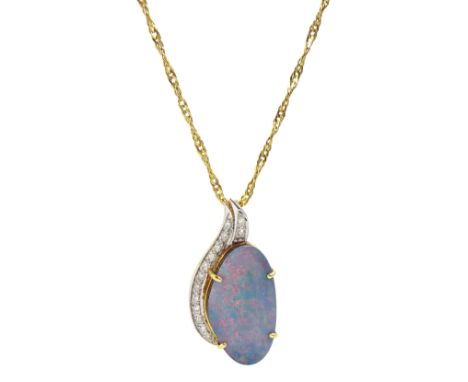 18ct gold opal doublet and milgrain set diamond pendant, stamped 750, on 9ct gold necklace, hallmarked Condition Report:18ct 