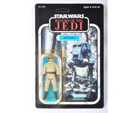 Star Wars - An original vintage 1984 Kenner made Star Wars carded MOC action figure ' AT-ST Driver '. Factory sealed upon its