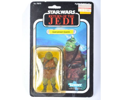 Star Wars - An original vintage 1983 Kenner made Star Wars carded MOC action figure ' Gamorrean Guard '. Factory sealed upon 