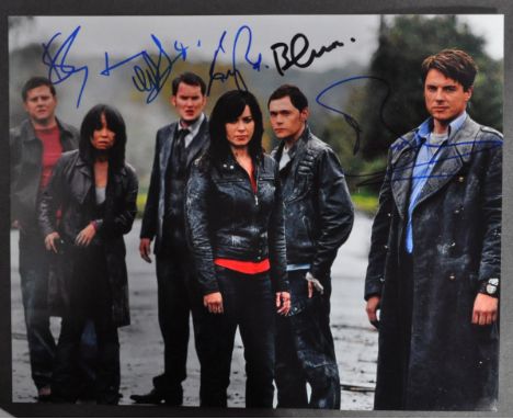 Doctor Who - Torchwood - a cast signed 8x10" colour photograph from the series, signed by x5 cast - John Barrowman, Eve Myles