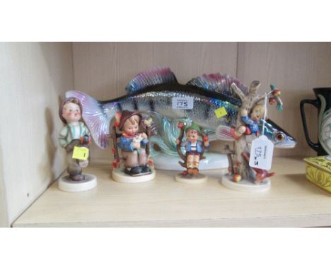 A Dutch Jena ceramic model of a rainbow trout, together with four Hummel figures