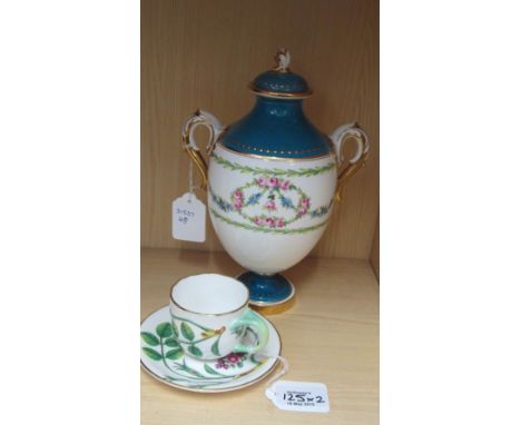 A Royal Worcester Blind Earl cabinet cup and saucer, together with a Minton twin handled covered urn, decorated with swags of