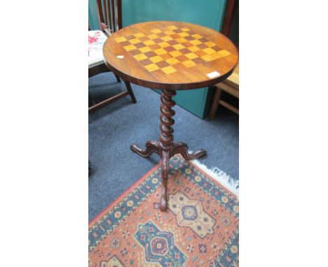 A Victorian rosewood and bird's eye maple occasional table, the chess board inlaid circular top on barley twist column, three