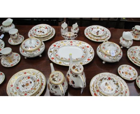 A matched Royal Crown Derby dinner and tea service, largely an eight place setting, comprising cups, saucers, dinner, dessert