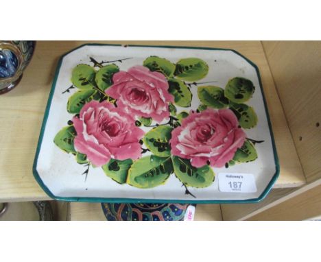 A Wemyss tray of canted rectangular form, typically decorated with pink roses and green foliage, painted printed and impresse