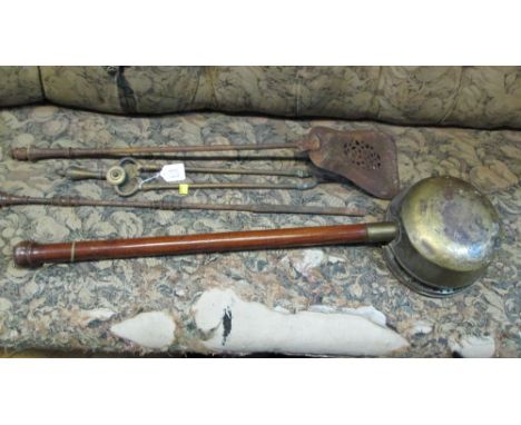 A collection of late 18th century/early 19th century brushed steel and lacquered brass hearth tools, and a late 18th century 