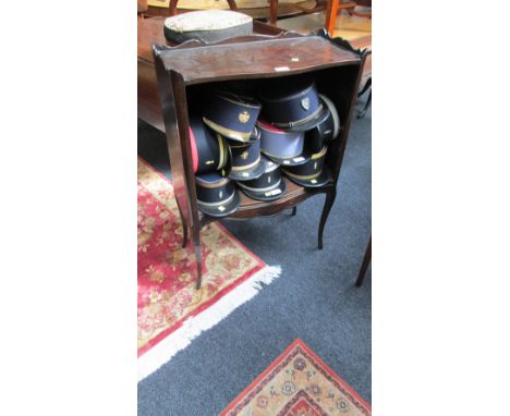 A reproduction serpentine fronted mahogany two shelf open bookcase on French cabriole legs