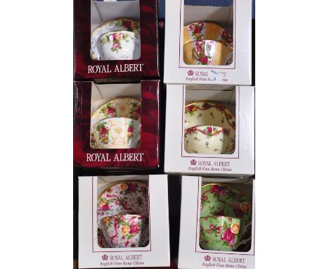 A large quantity of Royal Albert Christmas plates, "Old Country Roses, Ruby",  "Old Country Roses", "Chintz", "Pink Chintz" "