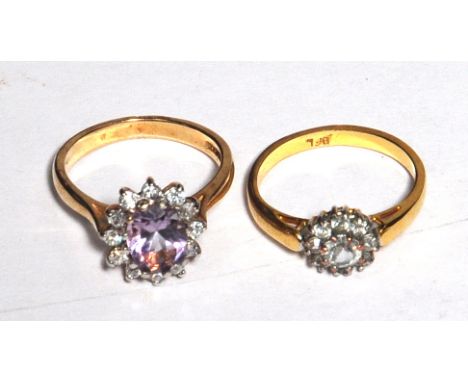 Two 9ct gold ladies dress rings, one set with large amethyst coloured central stone and white stones, size P, and the other f