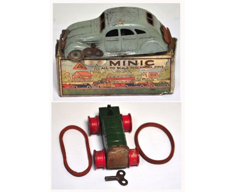 A Lines Bros. "Minic" streamlined clockwork saloon car with box and a further clockwork caterpillar tractor (af) (2). CONDITI