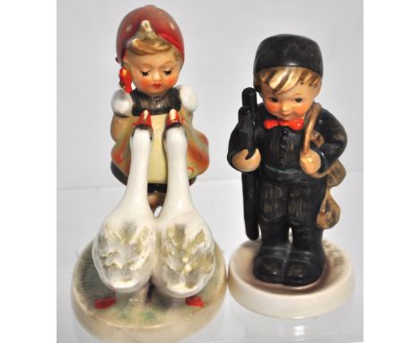 Two West German Hummel figures, a girl with geese and a boy with a ladder (2).