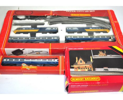 A boxed Hornby OO gauge "Inter-City 125" set including track, controller and locomotive, also an additional boxed restaurant/