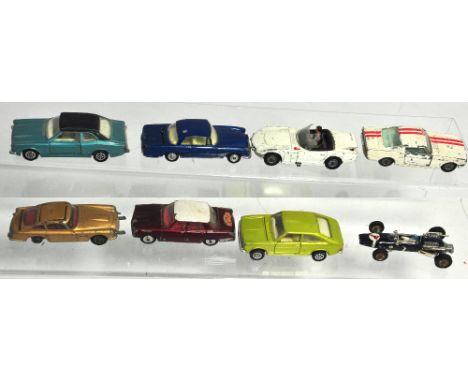 Eight assorted playworn Corgi diecast vehicles to include James Bond Aston Martin DB5, James Bond Toyota, Ford Mustang, Rover