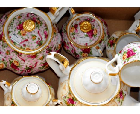 A Royal Albert Old Country Roses "Ruby Celebration", "Pink Chintz" teapot, sucrier and milk jug, also a Royal Albert "Rose Ca