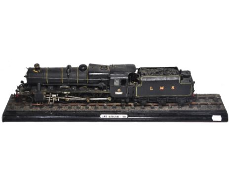 A scratch built O gauge model of a "Black Five" in LMS black, mounted on a short section of tack, length overall 63cm.