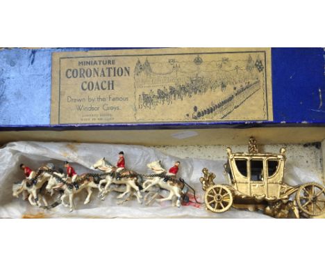 A Johillco miniature Coronation carriage, boxed. CONDITION REPORT Slight paint loss to some of the horses, otherwise good con