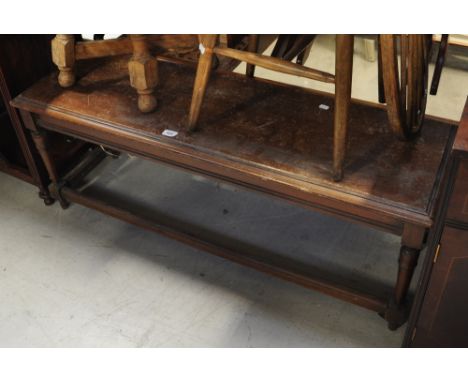 A wooden bench, reputedly from a branch the Midland Bank, length 120cm.