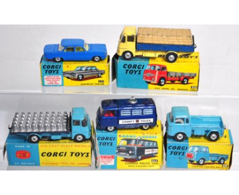 Two boxed Corgi ERF platform lorries no's.456 and 457, a Forward Control Jeep 409, Chevrolet Corvair 229 and boxed Commer Pol