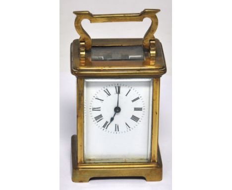 A 20th century brass carriage clock, Roman numerals to the dial, height 11.5cm.