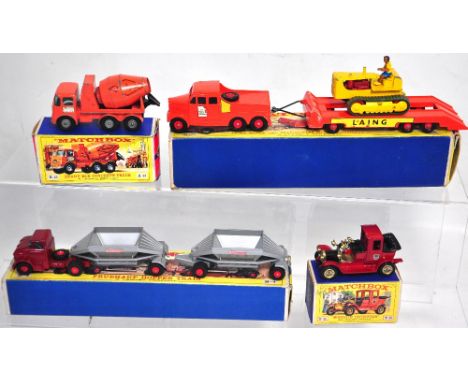 Four boxed Matchbox diecast vehicles, "Laing" prime mover with caterpillar tractor, "Hopper Train", "Ready-Mix" concrete truc