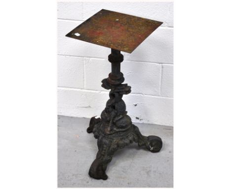 A late 19th early 20th century cast iron stand, the tripod support of serpentine form, height 70cm.