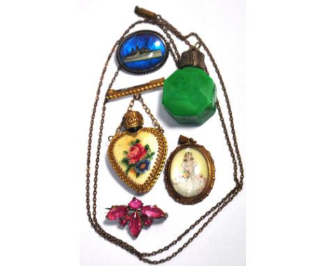 Two yellow metal miniature perfume bottles on chains, pendant with portrait of a young woman, a ship brooch and a floral broo