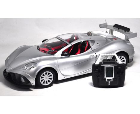 A 1/6th scale radio-control model of a sports roadster "The Fast And The Furious", boxed, length 63cm. CONDITION REPORT Origi