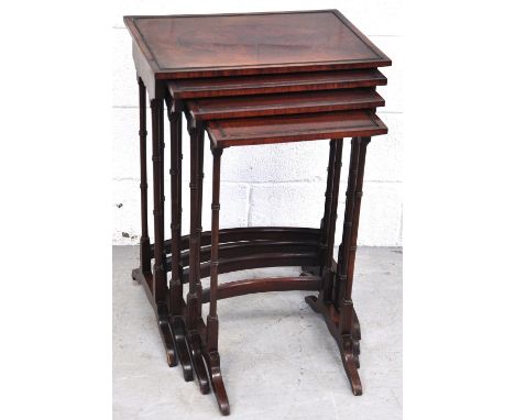 A nest of four early 20th century mahogany occasional tables on ring turned supports, largest width 50cm. CONDITION REPORT So