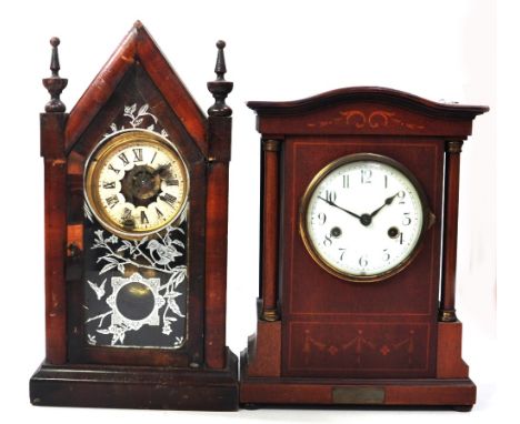A mahogany and inlaid mantel clock on stepped base Arabic numerals, and a cathedral shape mahogany skeleton clock (af) (2). 