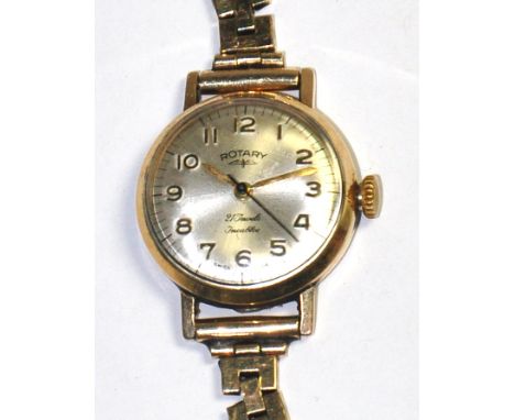 A 9ct gold ladies Rotary wristwatch with link bracelet, enamel dial set with Arabic numerals.