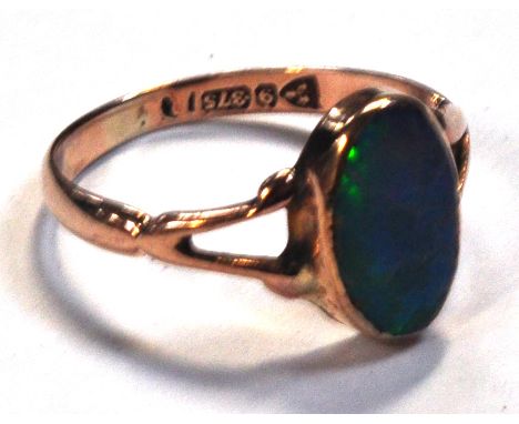 A 9ct gold ladies dress ring set with an oval opal, size M, approx weight 1.7ozt.