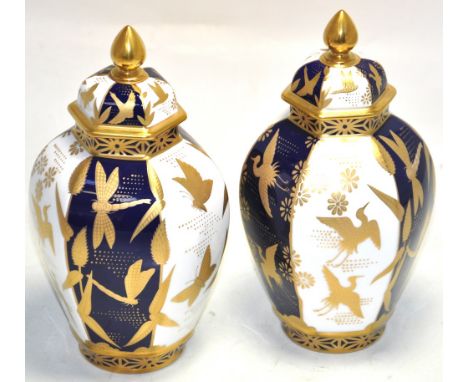 A boxed pair of Royal Worcester Japanesque hexagonal vases, a limited edition no.74/250, with certificates.  Inspired by Roya