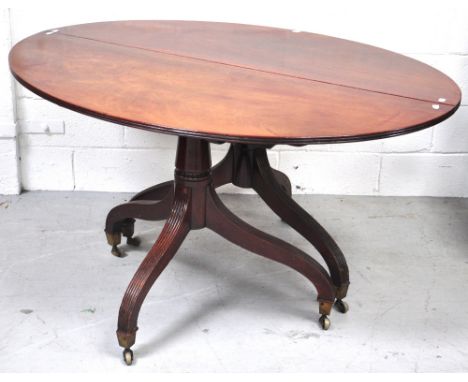 Two D end pieces on tripod bases from an extending dining table now lacking central section. CONDITION REPORT Both end pieces